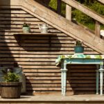 Uma Pequena Mesa Com Um Vaso De Planta Em Cima ZJr9 oaueBw